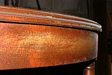 Water damage on this dining table is quickly restored by brushing on Wood Elixir, waiting a few minutes, then buffing with a clean cloth